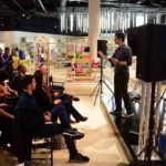 stage magician on stage at a corporate event