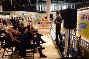 stage magician on stage at a corporate event