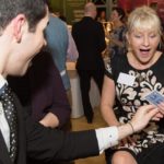 close up magician at a corporate event