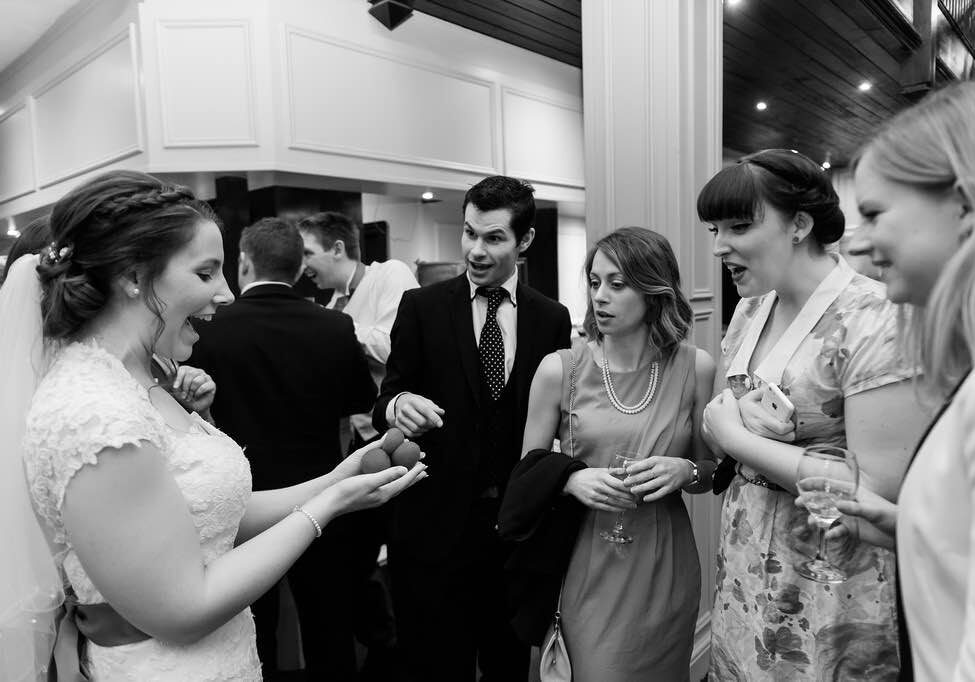 bride and wedding party reacting to nottingham magician performing amazing magic