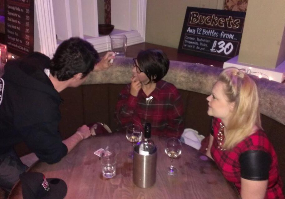 nottingham magician performing close up magic to girls in a bar