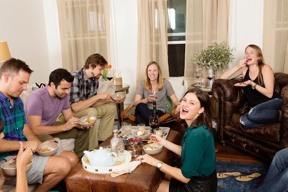people playing games at a dinner party entertainment