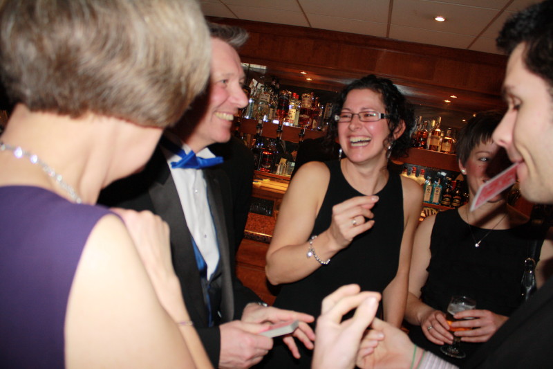 laughing guests at a black tie event in cheshire