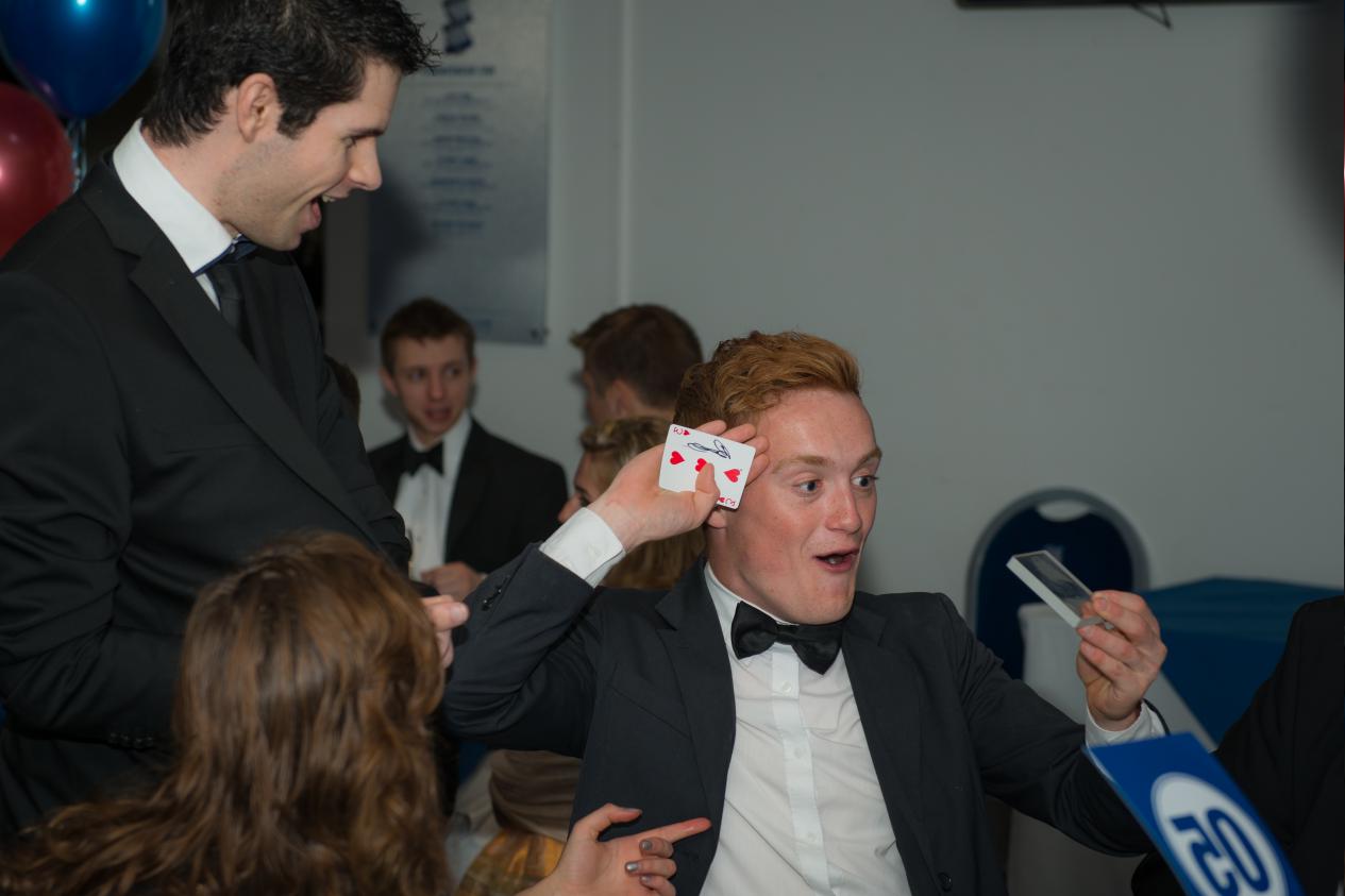 man at a corporate event amazed by close up magician ed sumner