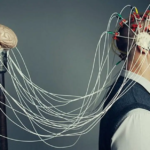 an image of a mind reader hooked up to a brain