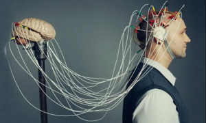 an image of a mind reader hooked up to a brain